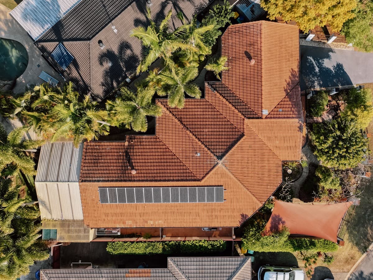 Roof restoration project - drone shot of residential home
